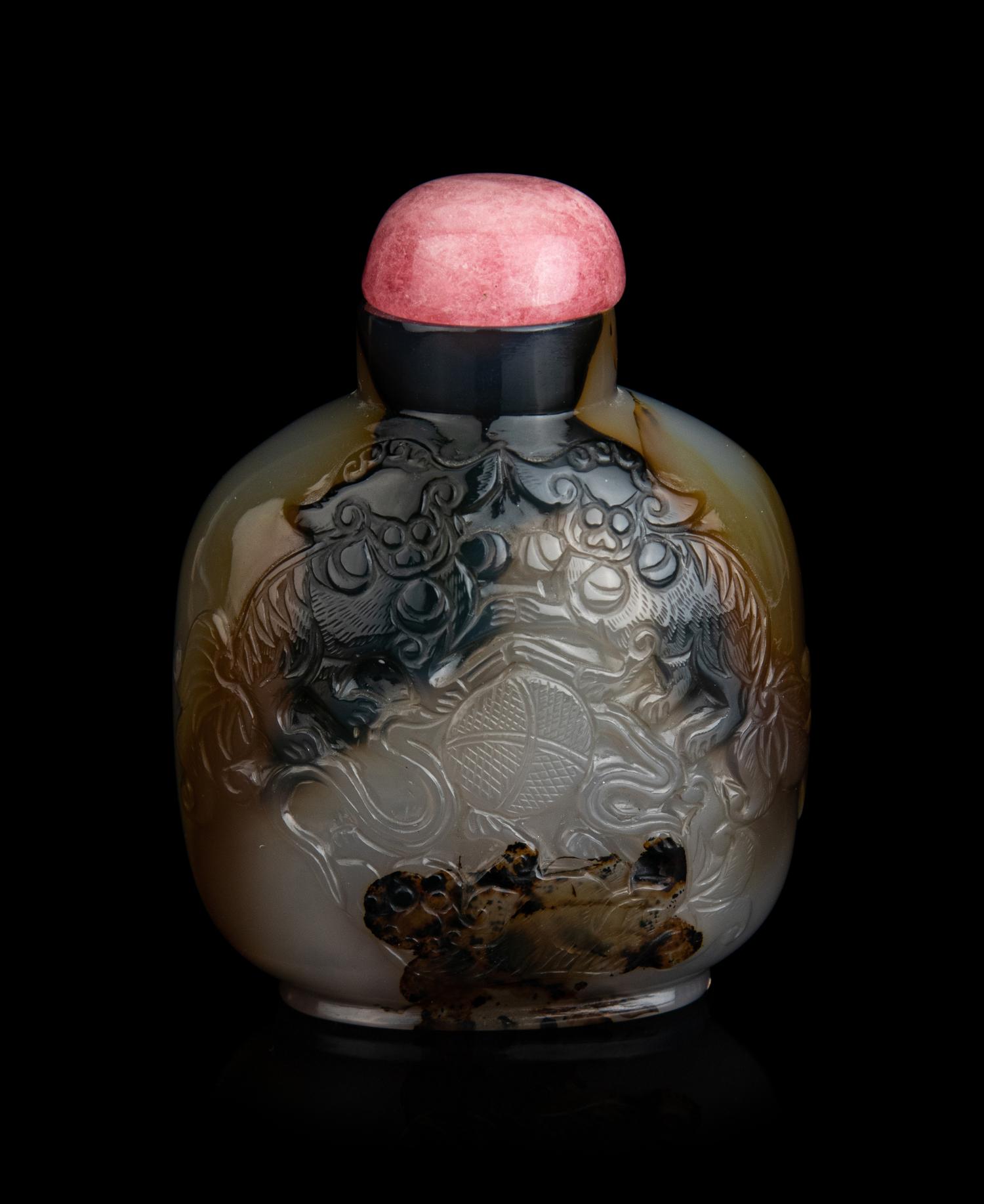 A Chinese Carved Agate 'Fu Lion' Snuff Bottle