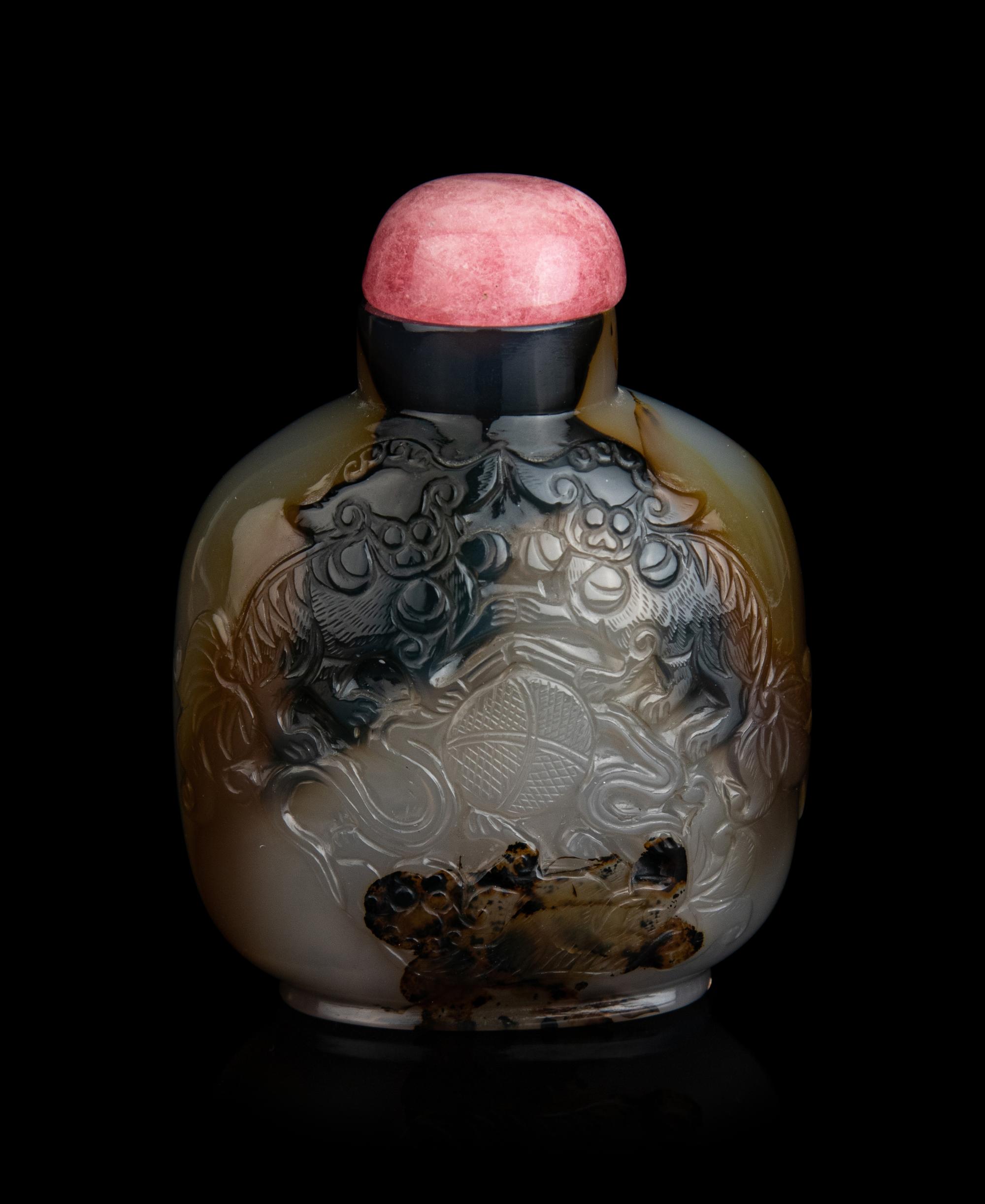 A Chinese Carved Agate 'Fu Lion' Snuff Bottle