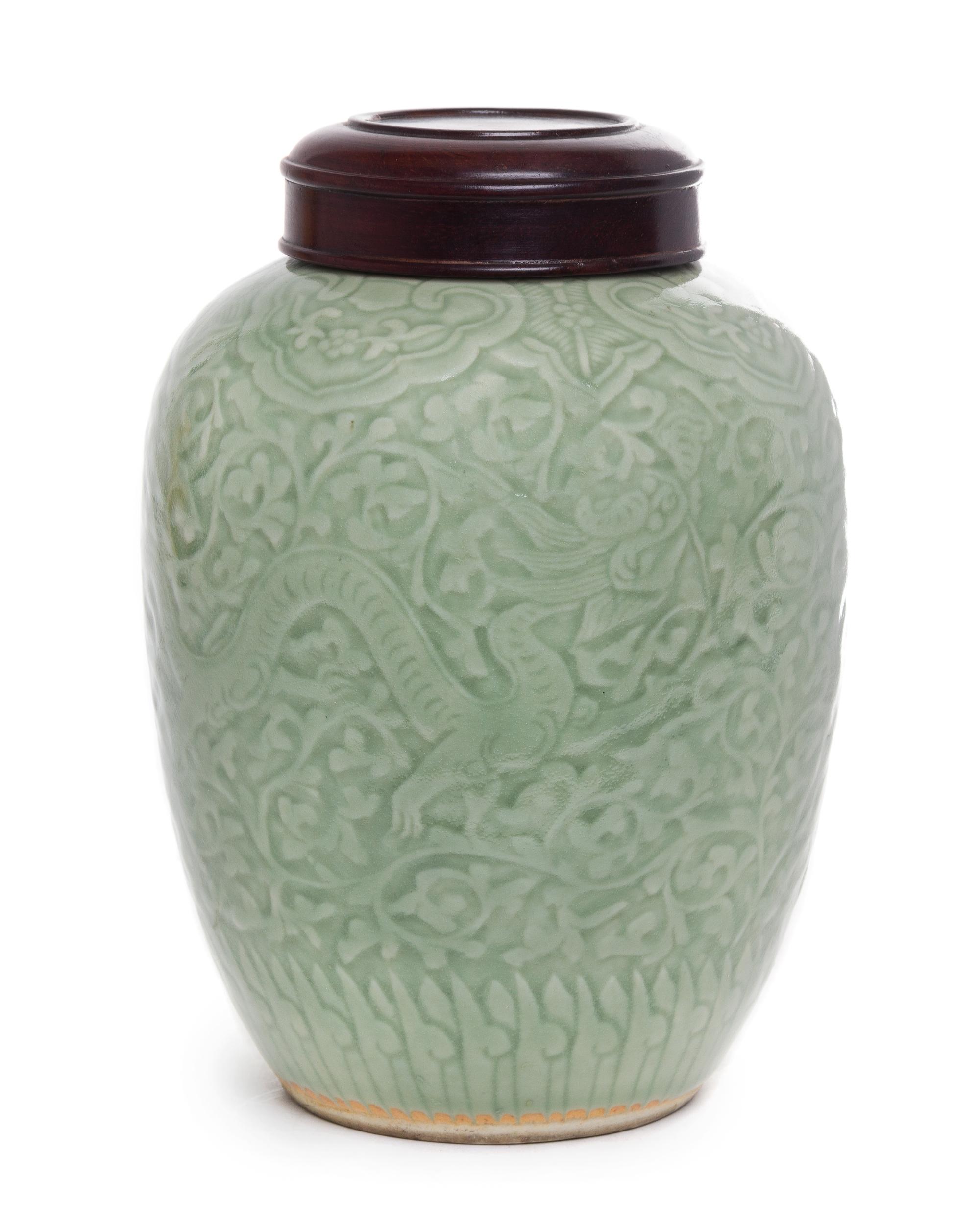 A Celadon Glazed Porcelain Jar Height 9 1/2 inches.