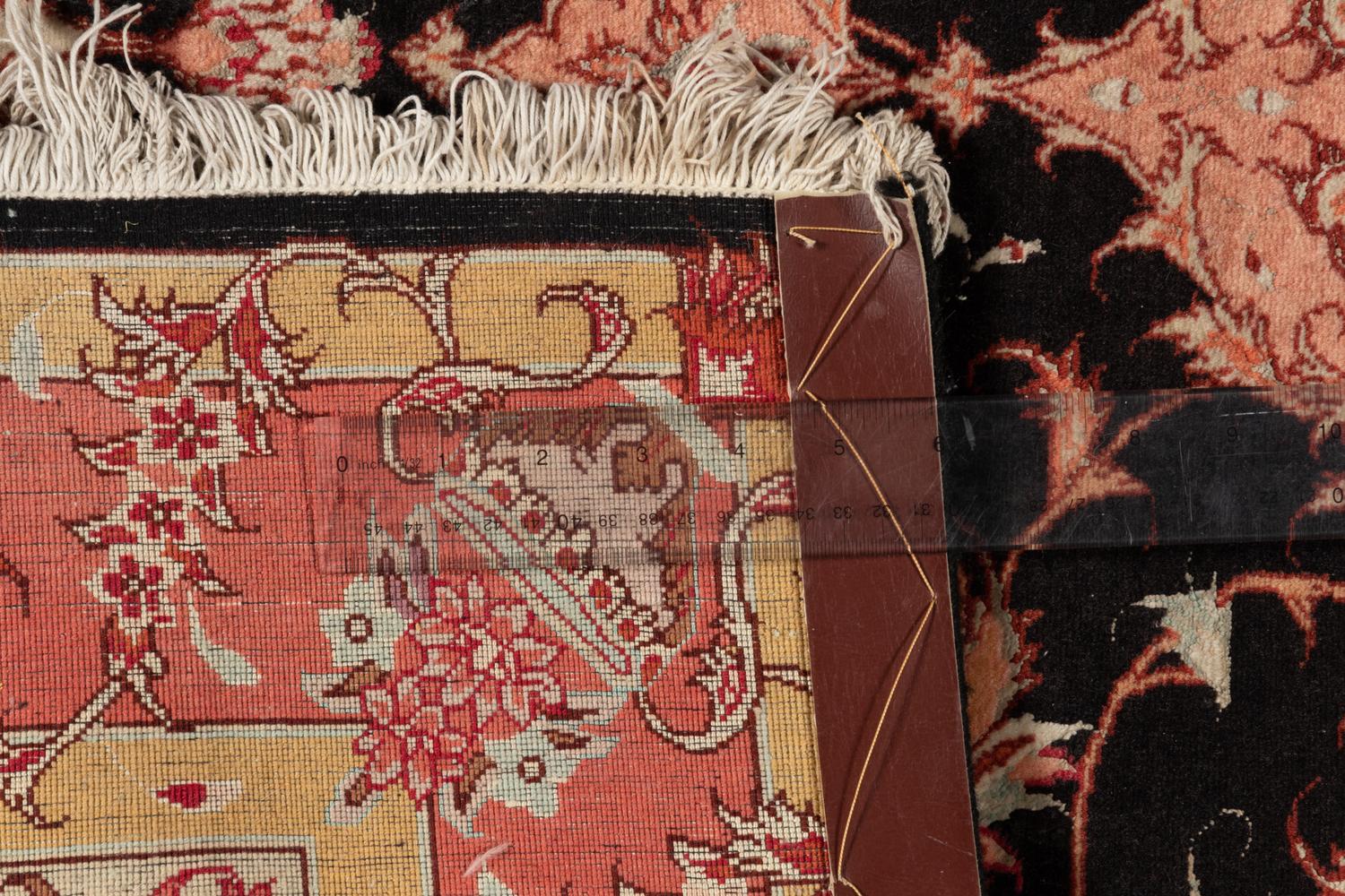 A Tabriz Wool Rug
