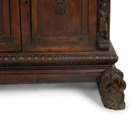 A Continental Baroque Walnut Cabinet