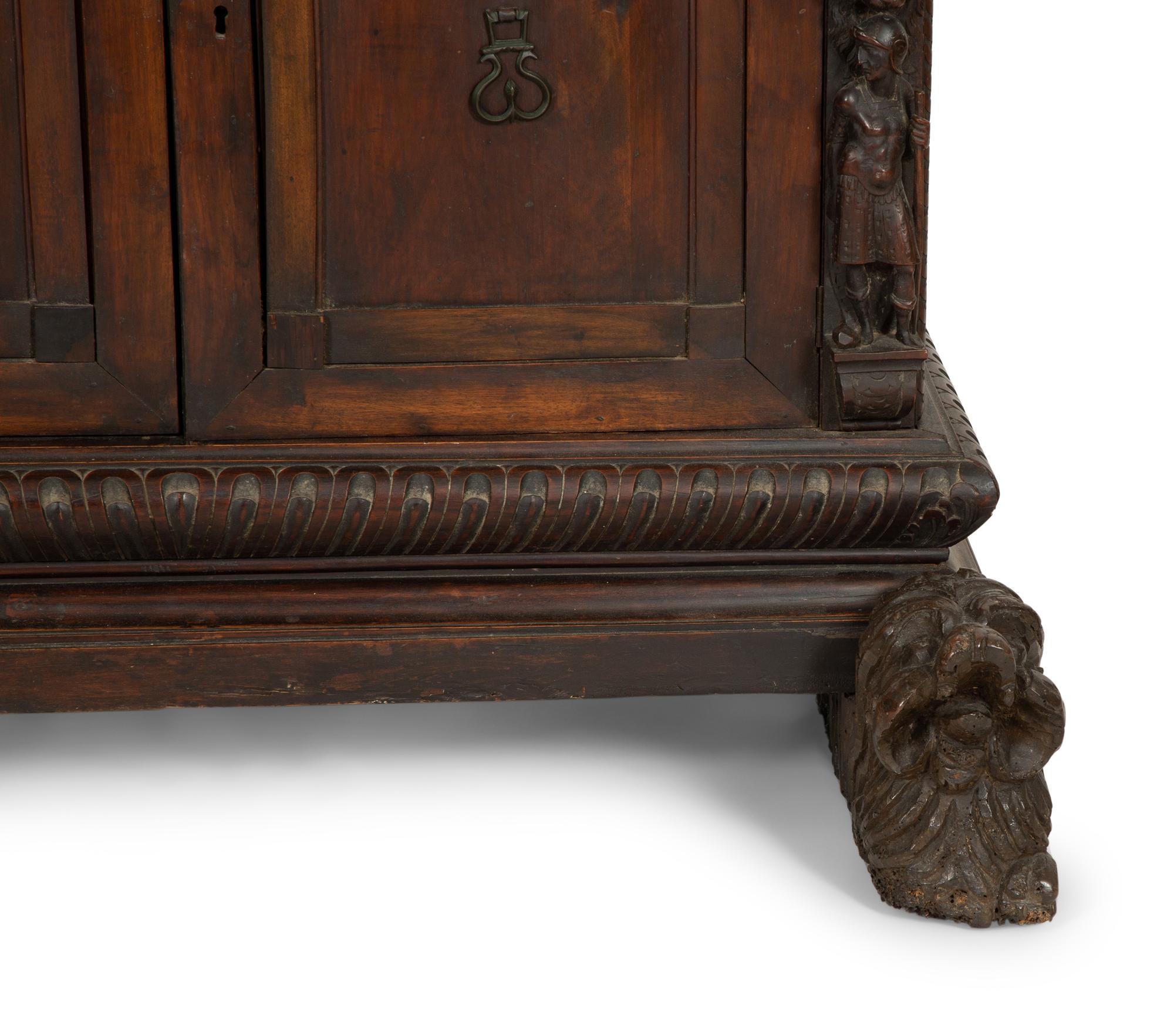 A Continental Baroque Walnut Cabinet