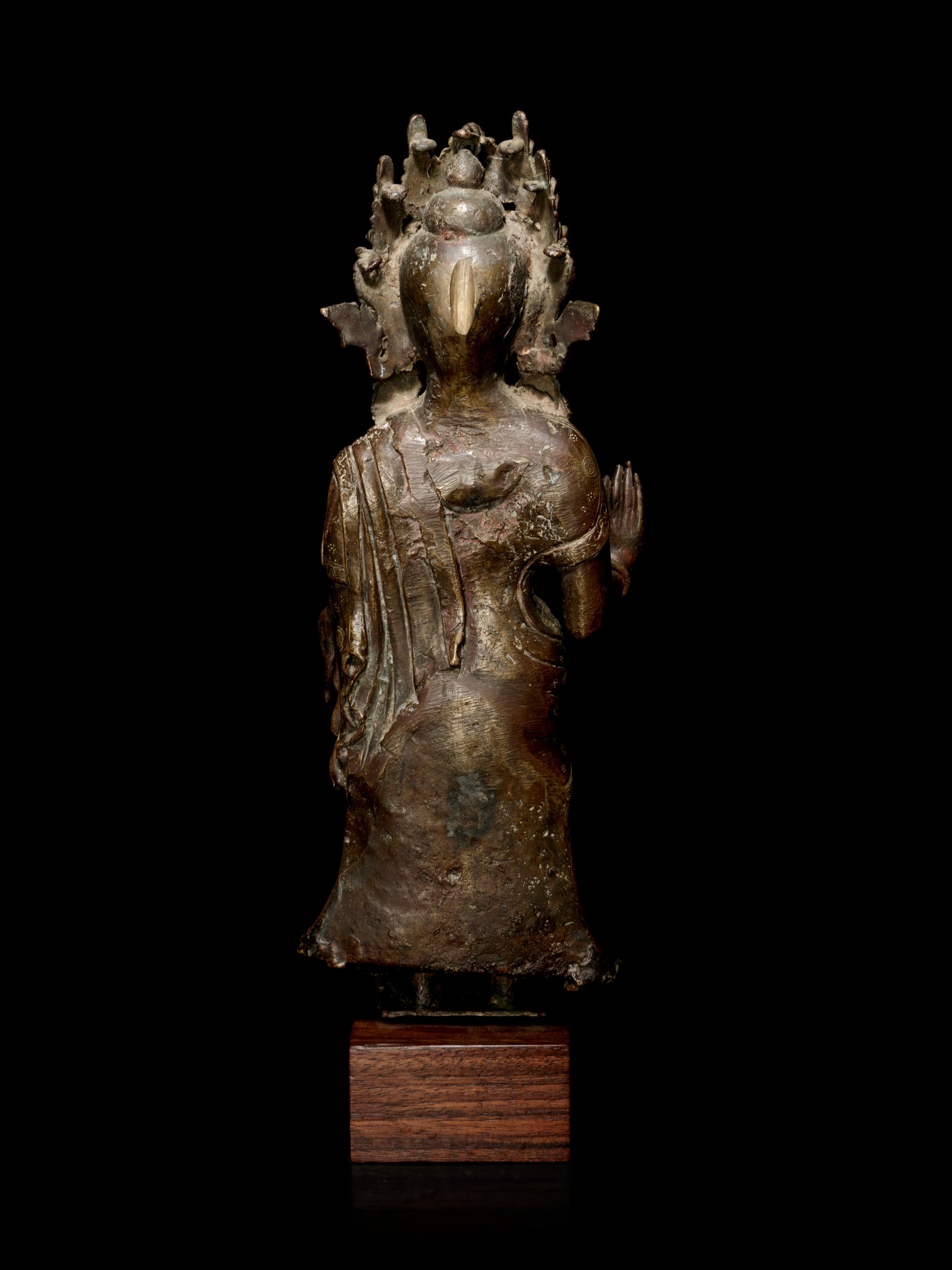 A Large Tibetan Gilt Bronze Figure of Buddha Dipankara
