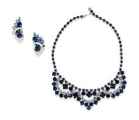 A Pair of Eisenberg Silvertone Blue Rhinestone Earclips,