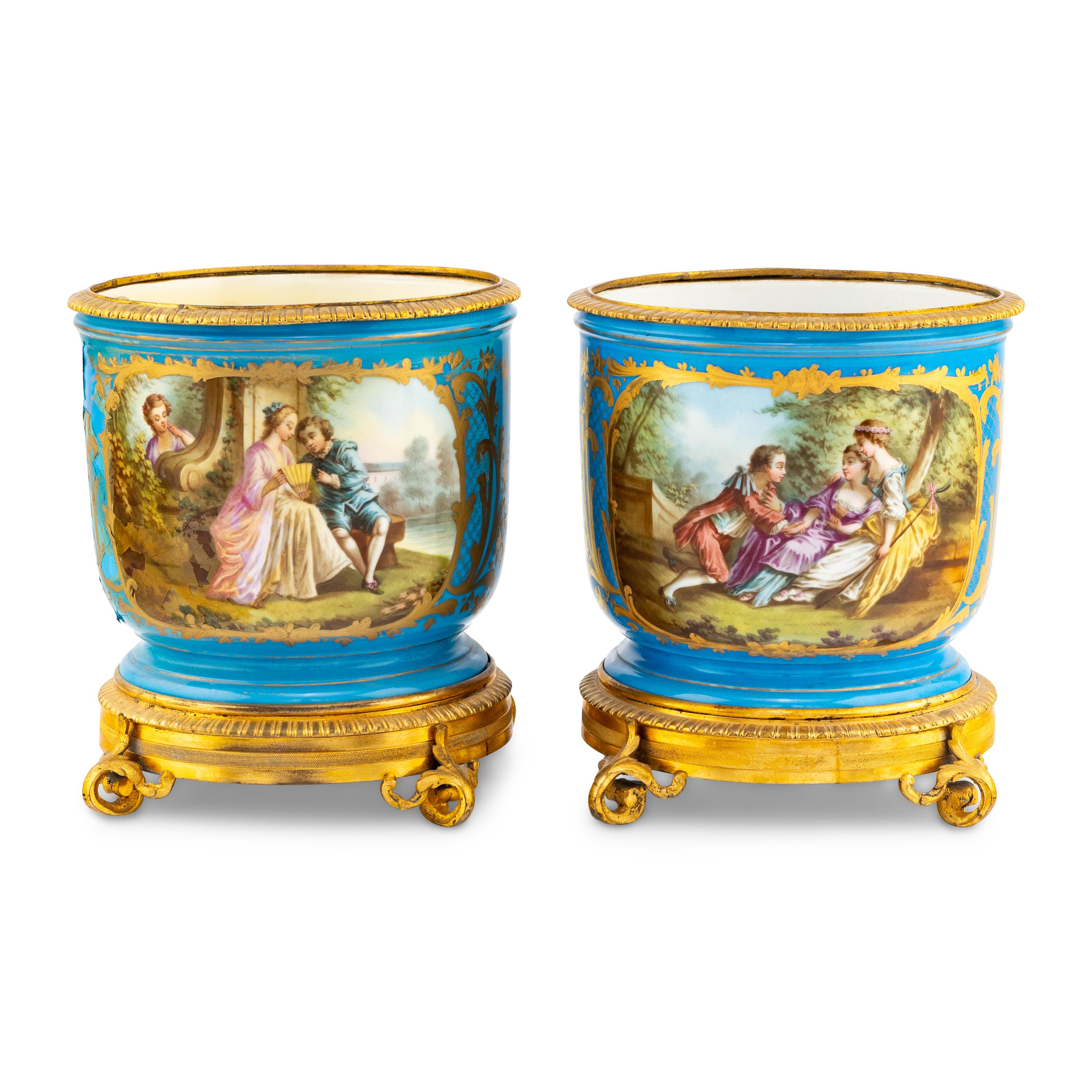 A Pair of Sèvres Style Porcelain and Gilt Bronze Mounted Cache Pots