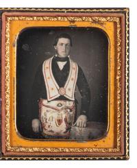 [EARLY PHOTOGRAPHY]. Sixth plate daguerreotype of an Odd Fellow in regalia featuring fine hand tinting.