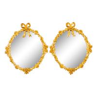 A Pair of Continental Bronze Mirrors