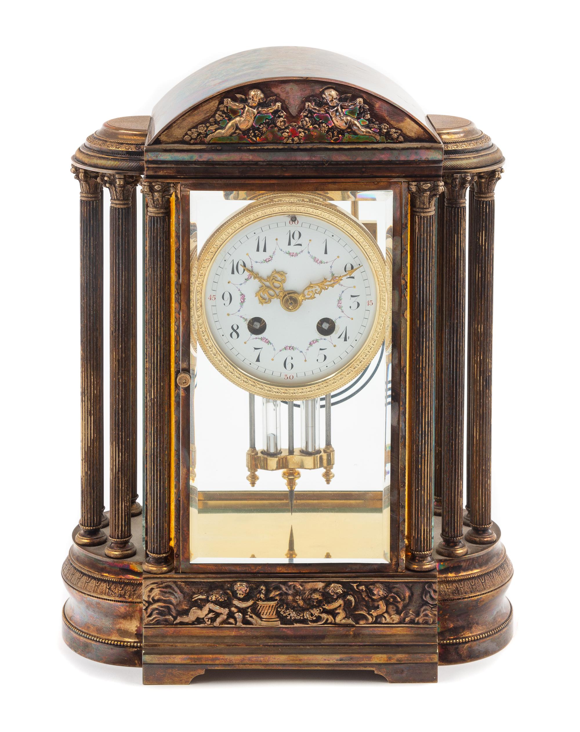 A French Silver-Plate Mantel Clock Height 13 x width 10 x depth 5 1/4 inches. — CIRCA 1900