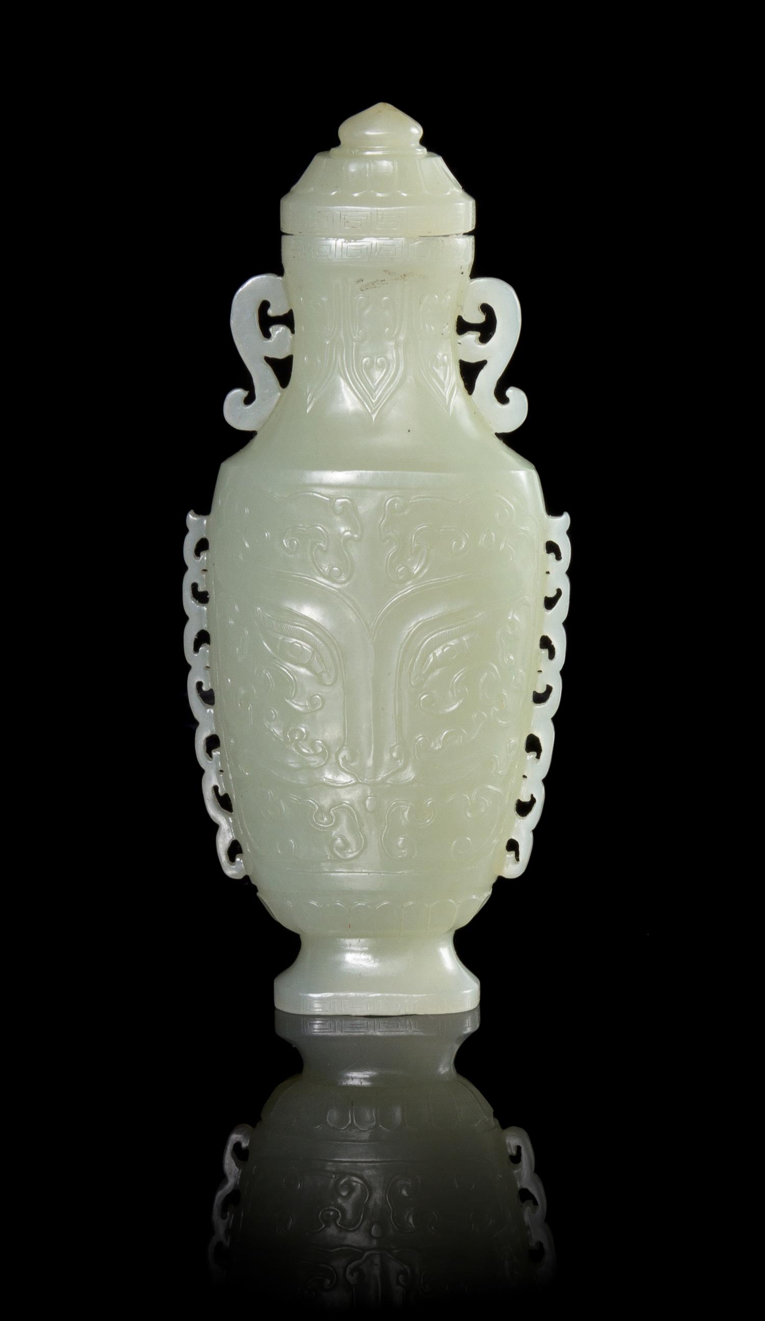 A Celadon Jade Vase Height 5 1/2 inches.