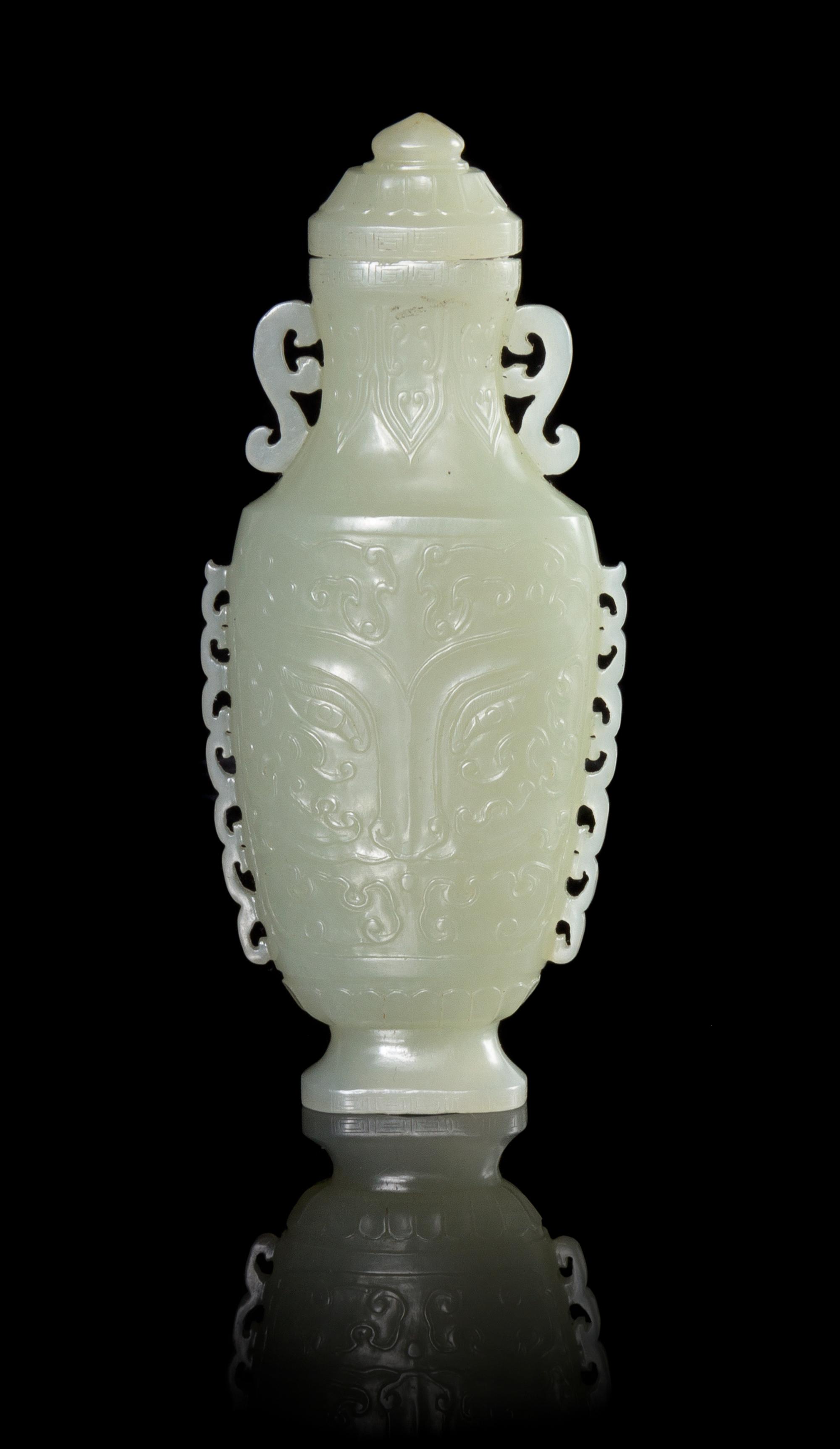 A Celadon Jade Vase Height 5 1/2 inches.