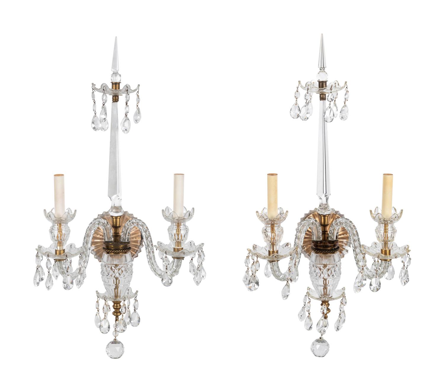 A Pair of Continental Cased and Cut Glass Two Light Sconces