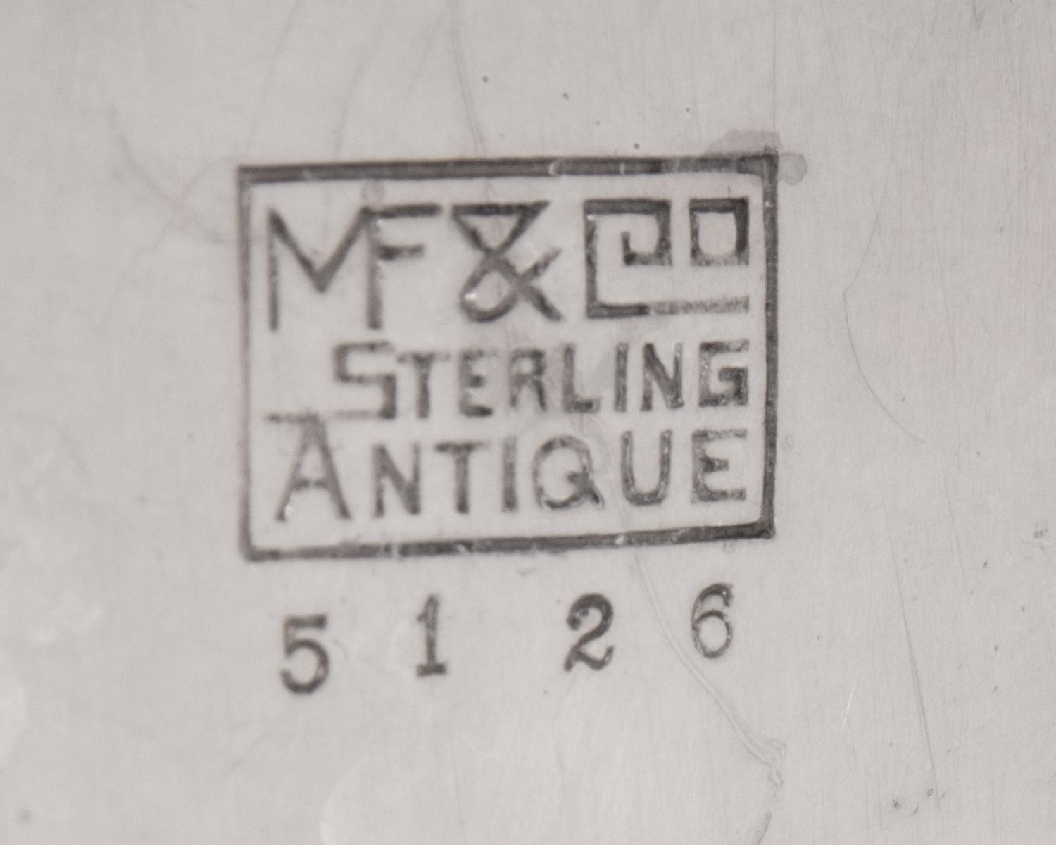 A Pair of American Silver Candlesticks