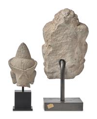 Two Khmer Style Stone Heads of Male Deities