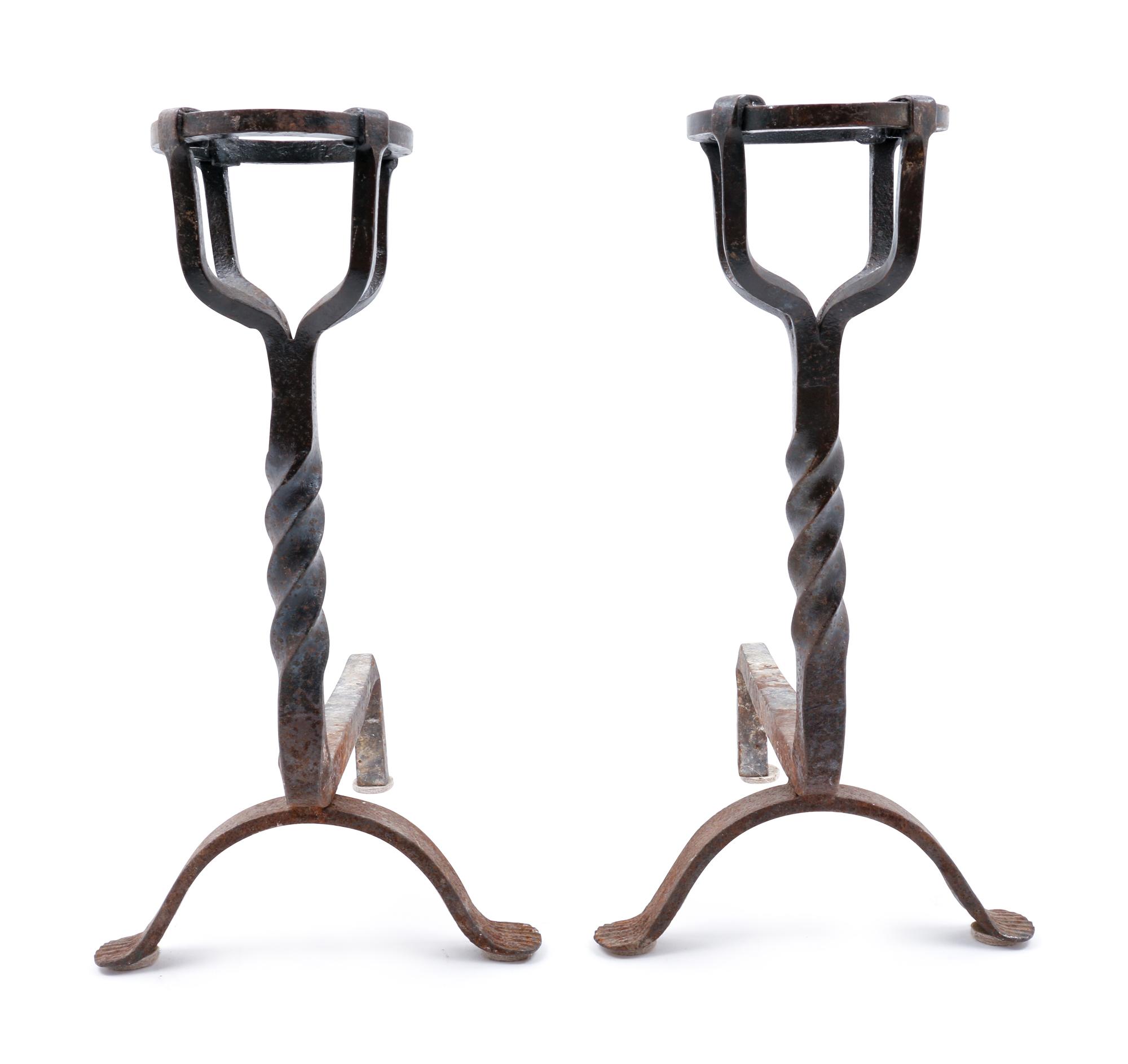 A Pair of Renaissance Revival Wrought Iron Andirons