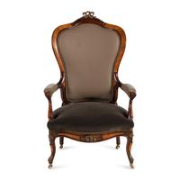 A Rococo Revival Style Armchair