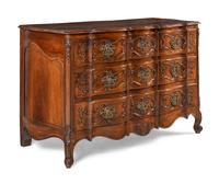 A Louis XV Walnut Serpentine Front Commode