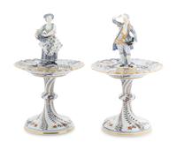 A Pair of Meissen Porcelain Figural Sweetmeat Dishes