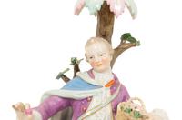 A Pair of Meissen Porcelain Figural Candelabra