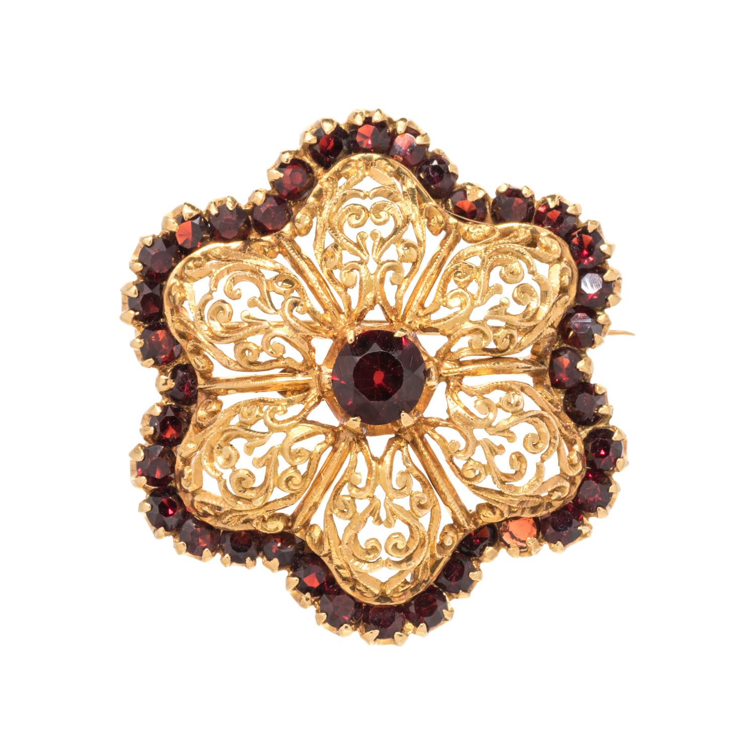 YELLOW GOLD AND GARNET BROOCH