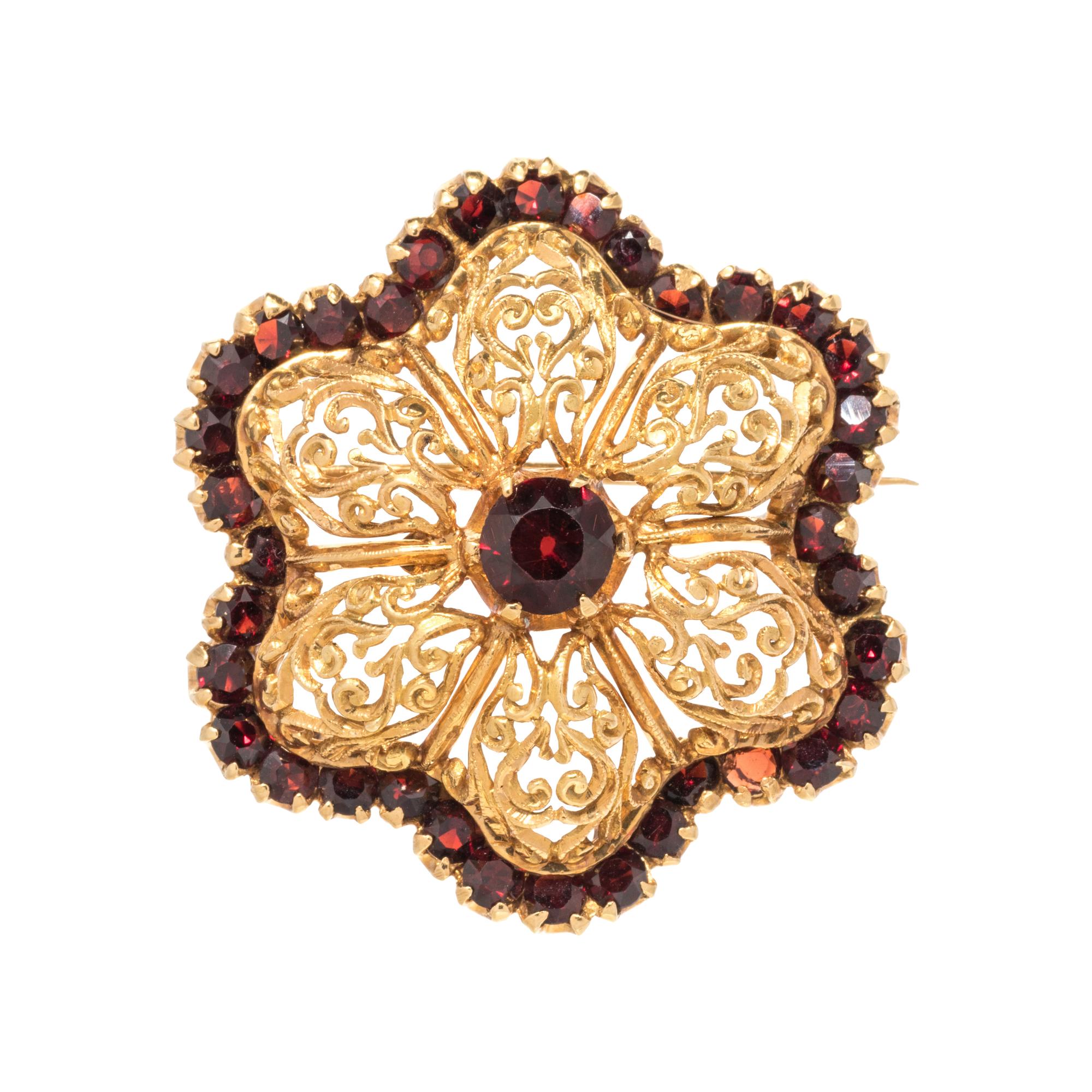 YELLOW GOLD AND GARNET BROOCH