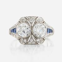 A diamond, sapphire, and platinum ring, J. E. Caldwell & Co.
