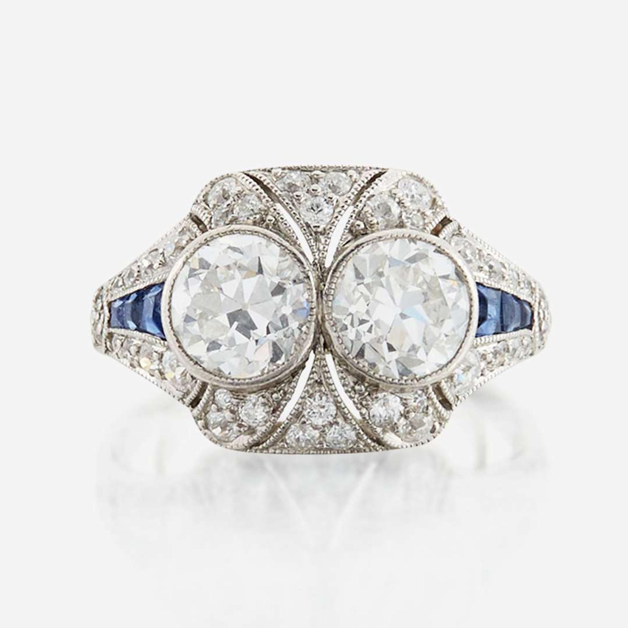 A diamond, sapphire, and platinum ring, J. E. Caldwell & Co.