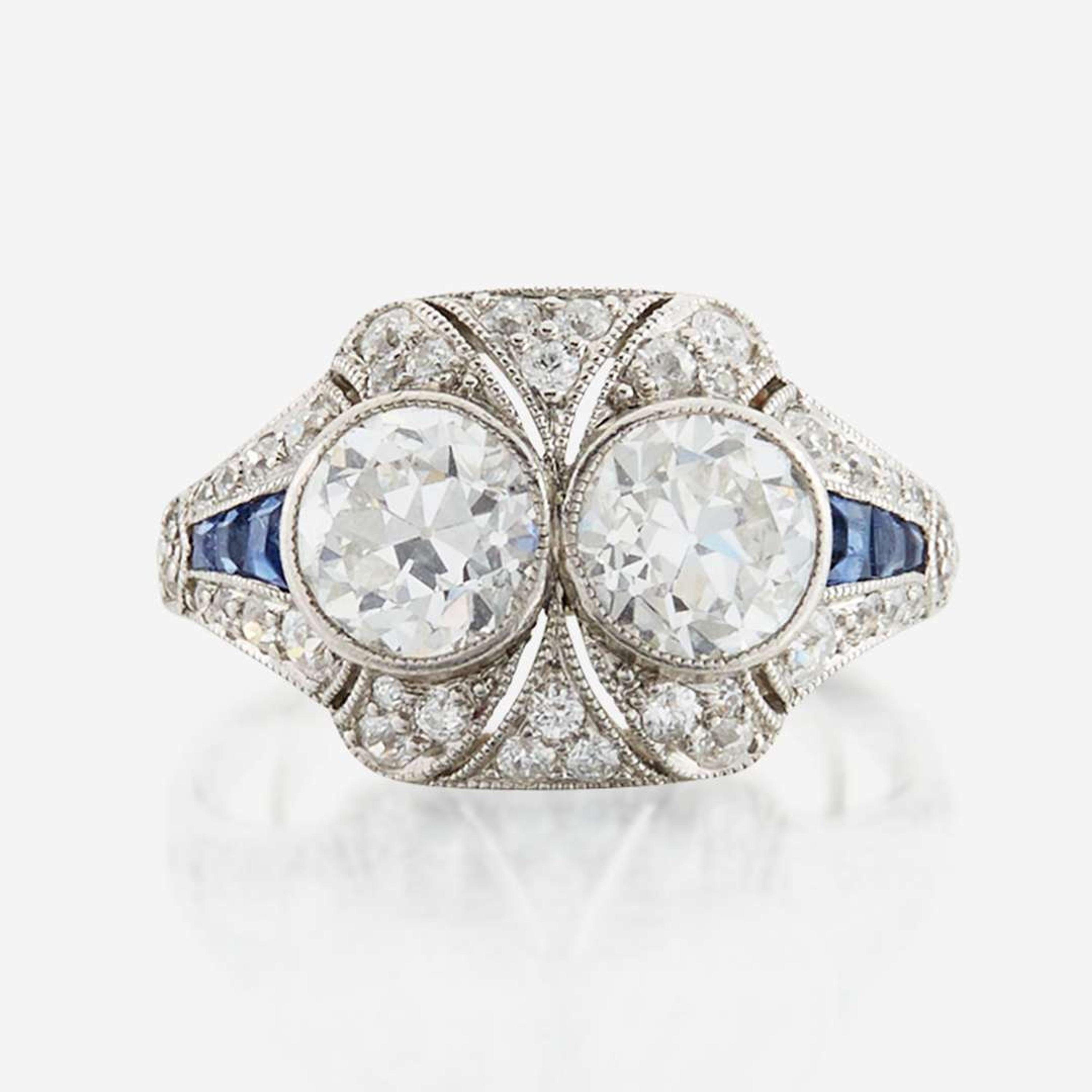 A diamond, sapphire, and platinum ring, J. E. Caldwell & Co.