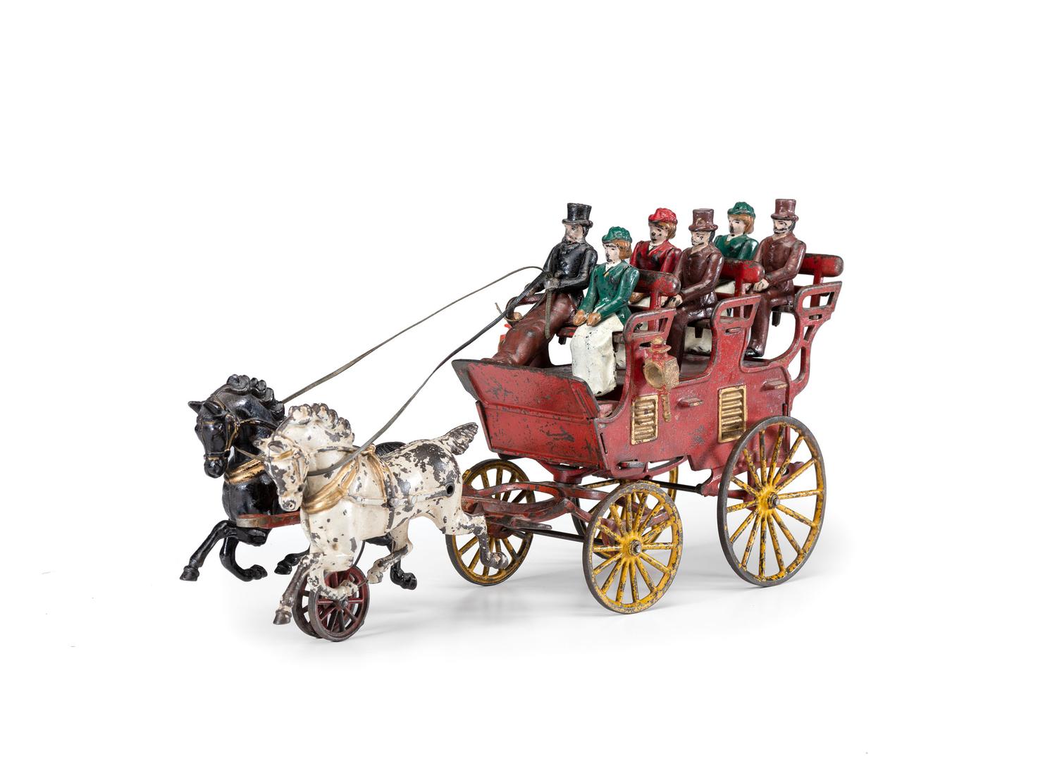 A Hubley Cast Iron Three-Seat Two-Horse Drawn Brake