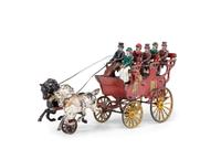A Hubley Cast Iron Three-Seat Two-Horse Drawn Brake