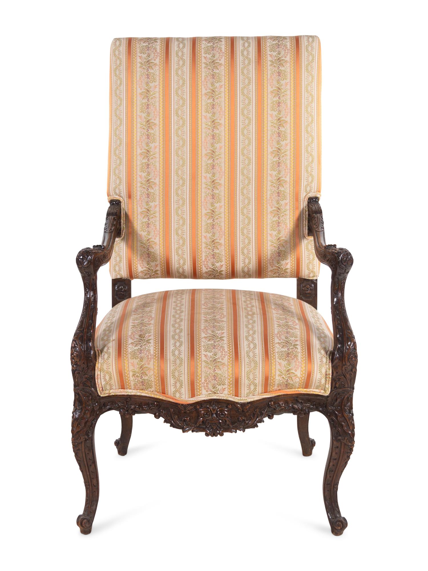 A Régence Style Carved Walnut Fauteuil