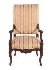 A Régence Style Carved Walnut Fauteuil
