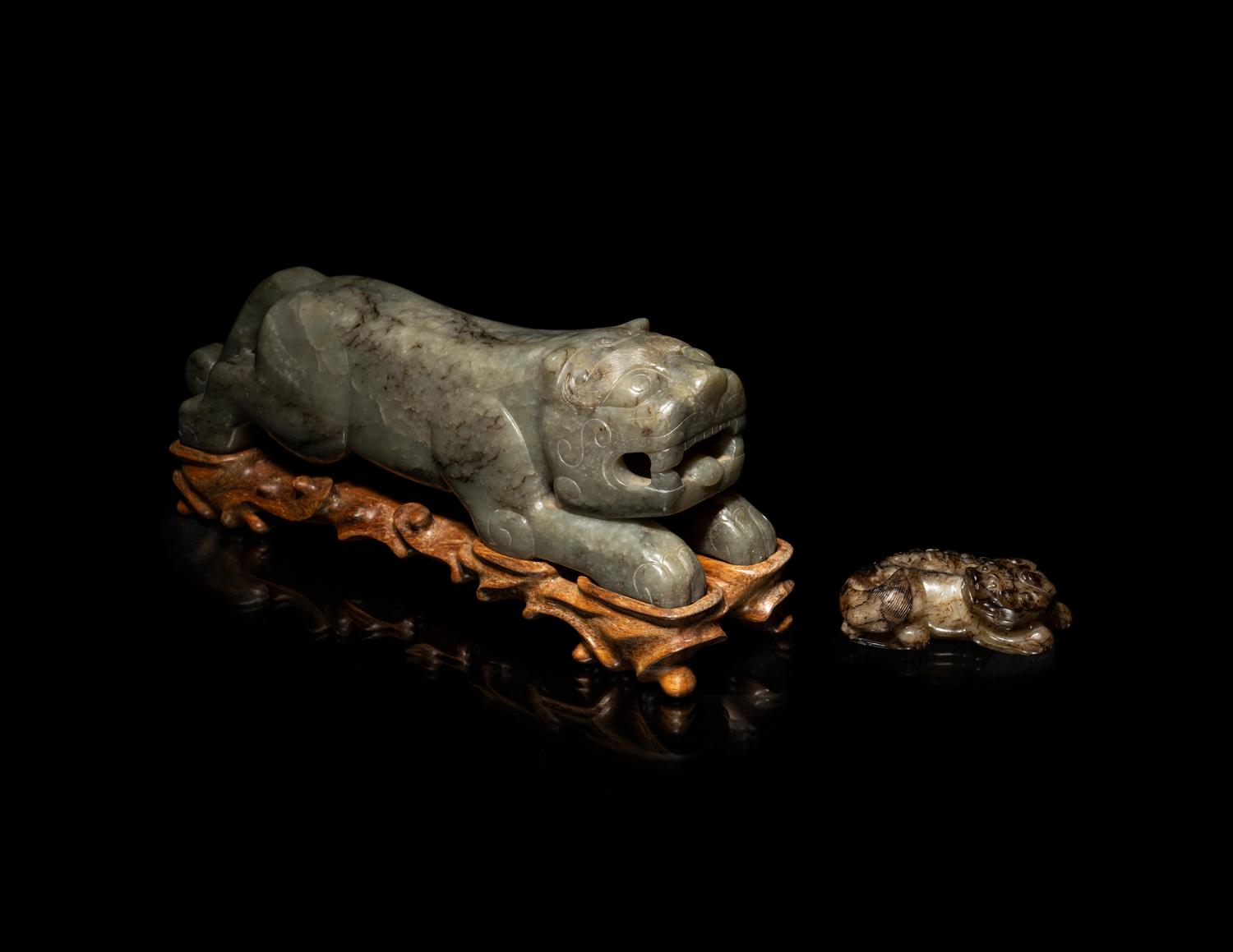 Two Chinese Mottled Jade Figures of Beasts