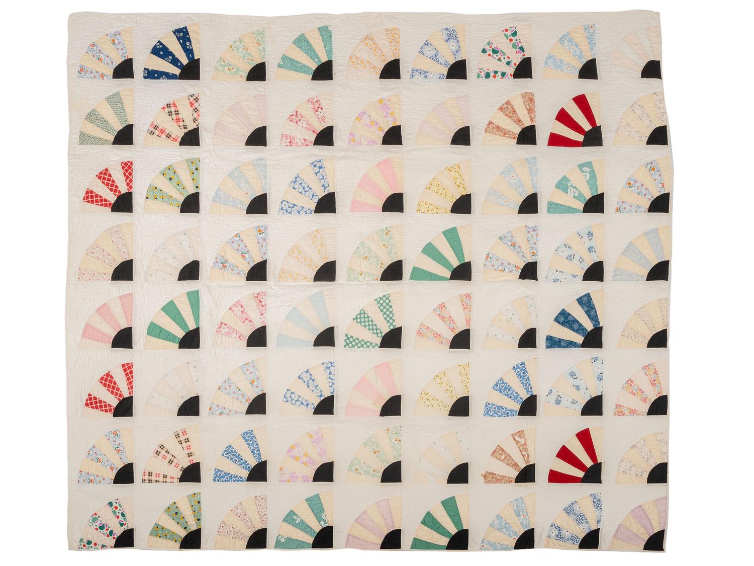 A Fan or Rising Sun Pattern Pieced Cotton Quilt
