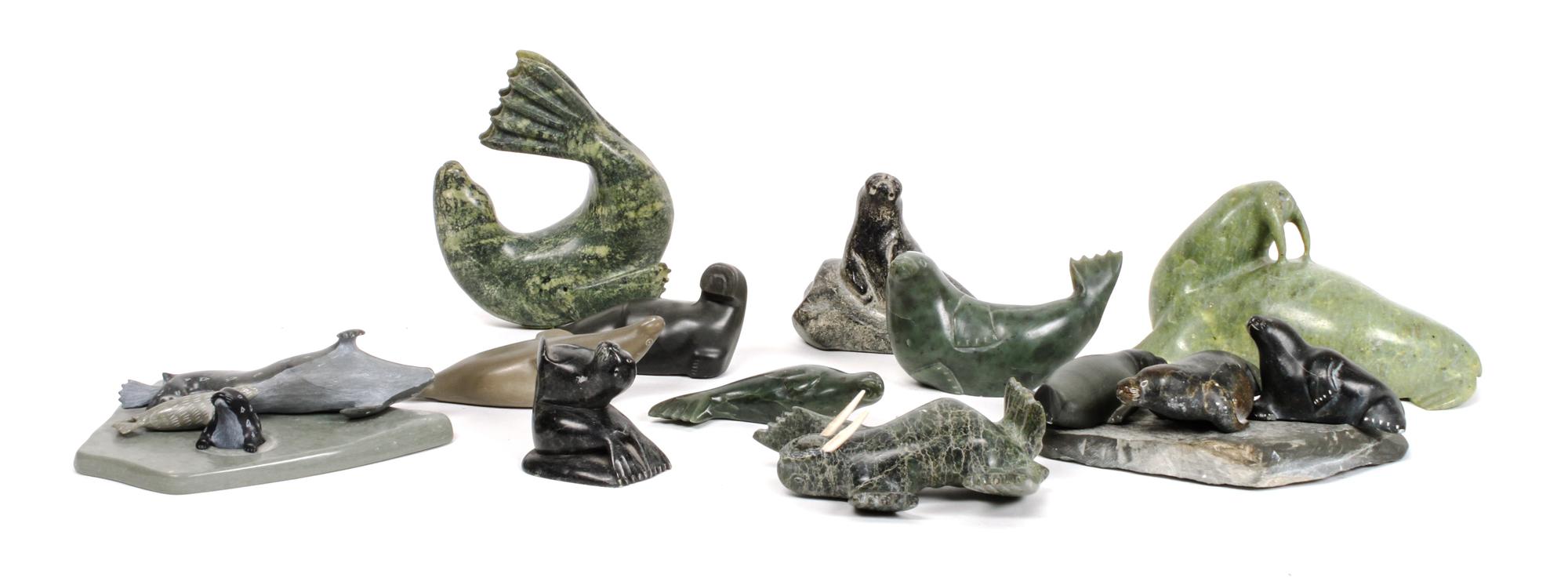 Eleven Inuit Hardstone Sculptures of Seal, Walrus and Whale Height of largest 4 1/2 x width 7 inches.