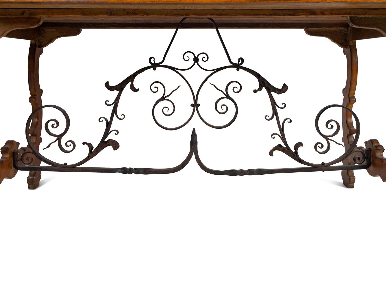 A Spanish Baroque Style Iron-Mounted Oak Trestle Table