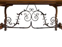 A Spanish Baroque Style Iron-Mounted Oak Trestle Table