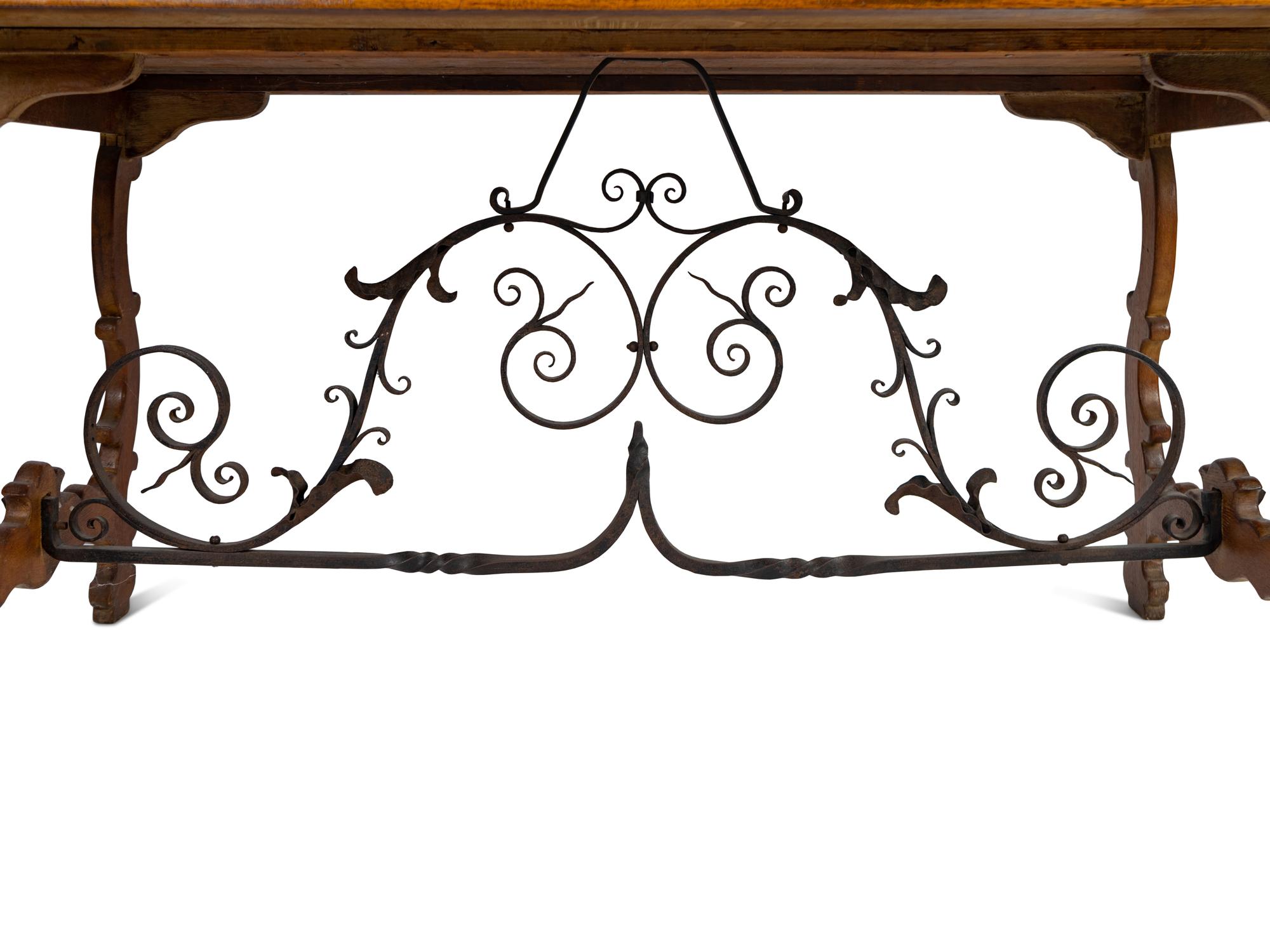A Spanish Baroque Style Iron-Mounted Oak Trestle Table