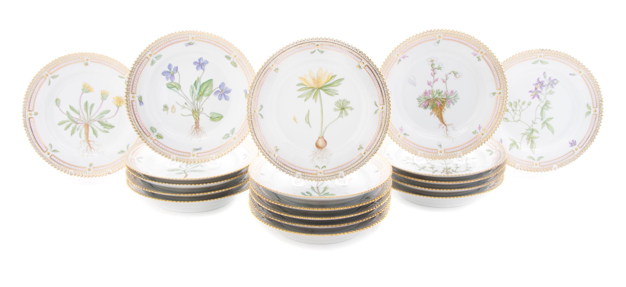 Eighteen Royal Copenhagen Flora Danica Bread Plates Diameter 3/4 inches.