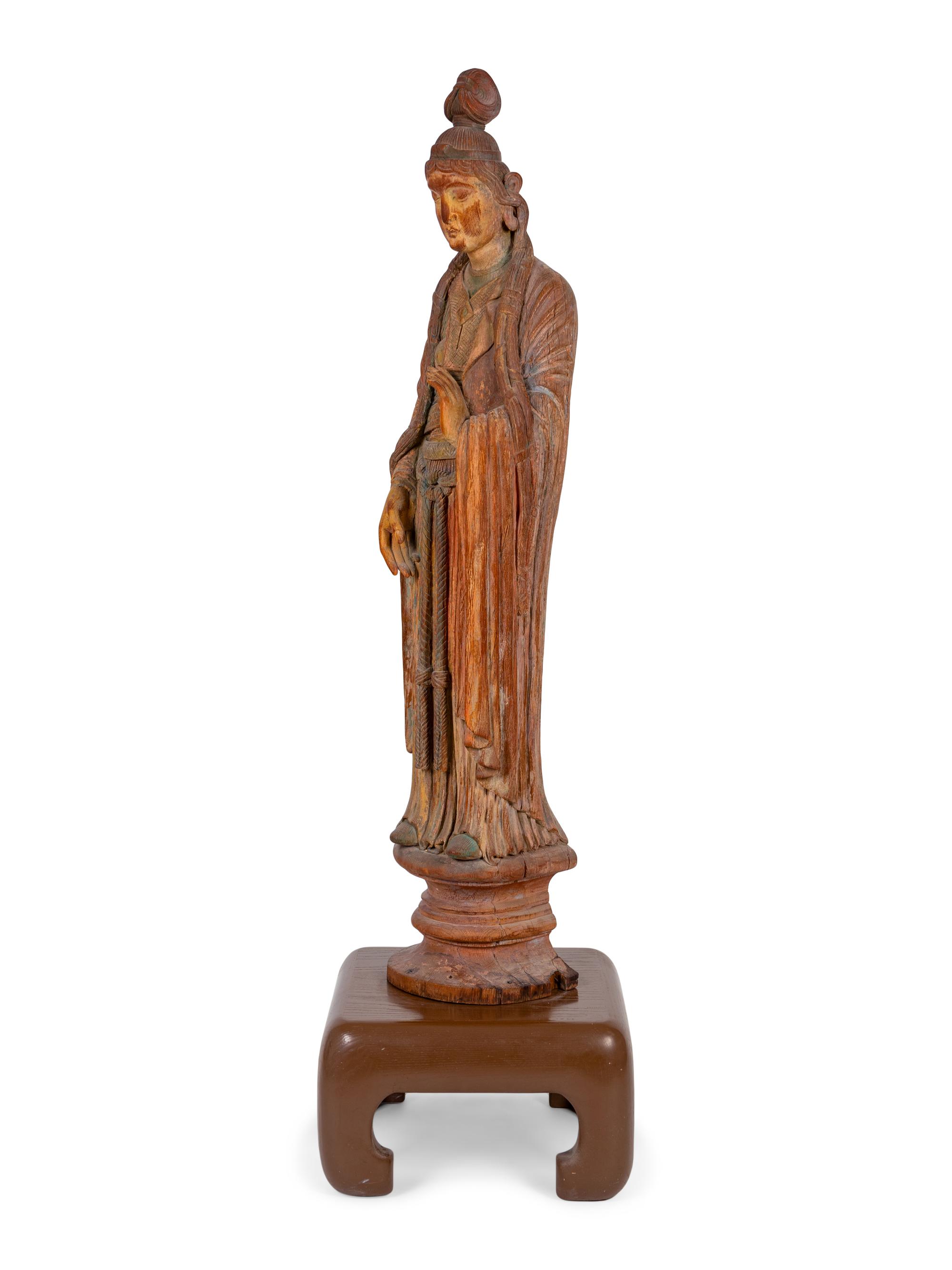 A Chinese Carved and Polychromed Hardwood Figure of Quan Yin — LATE 19TH / EARLY 20TH CENTURY