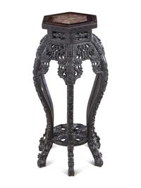 A Chinese Carved Hardwood and Marble-Inset Pedestal Table