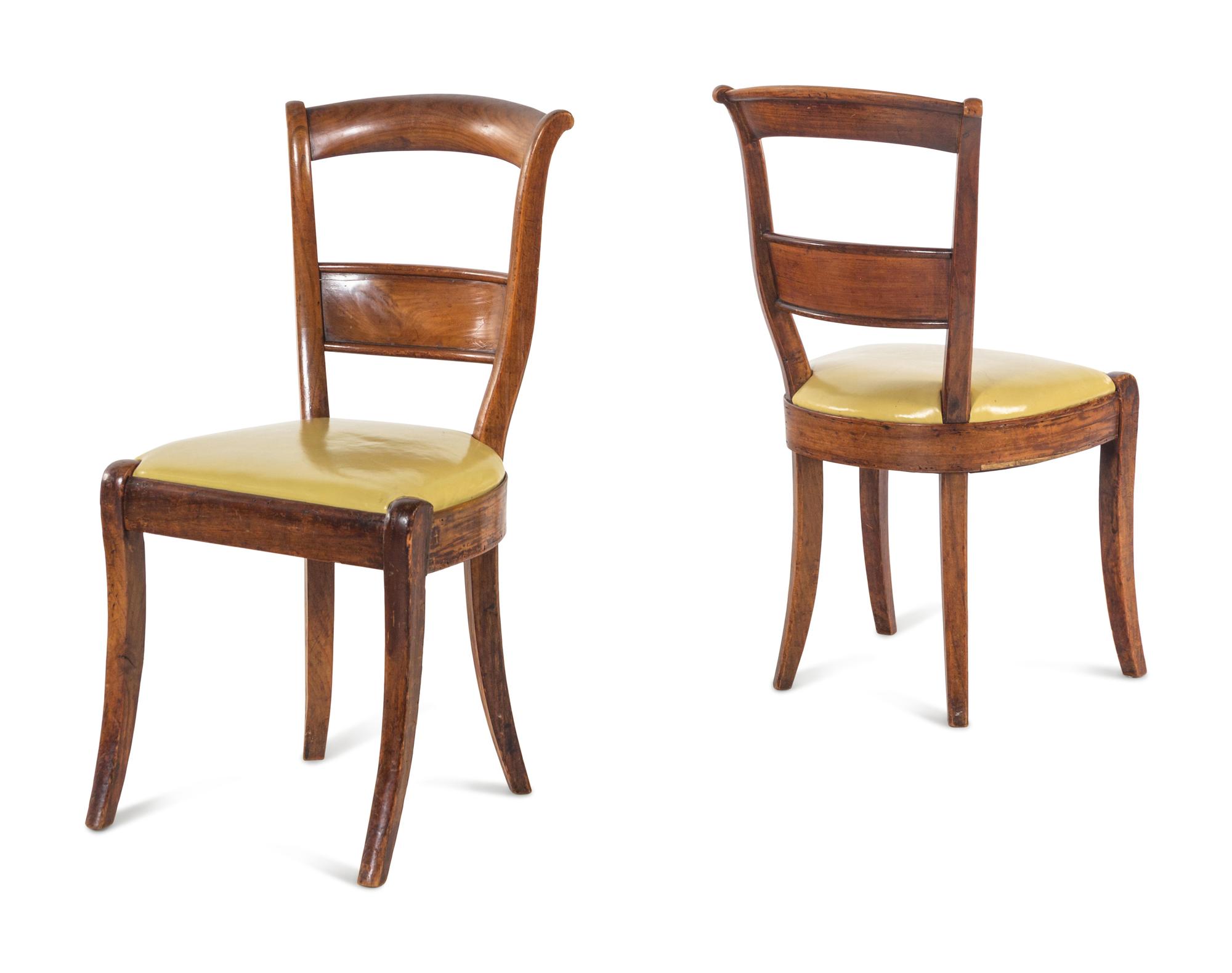 A Set of Eight French Pearwood Dining Chairs