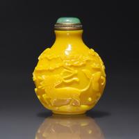 An Imperial Chinese Carved Yellow Glass Snuff Bottle, Qing Dynasty, Circa 1750-1820 — 1750-1820年 御製鷄油黃料吉祥圖鼻煙壺