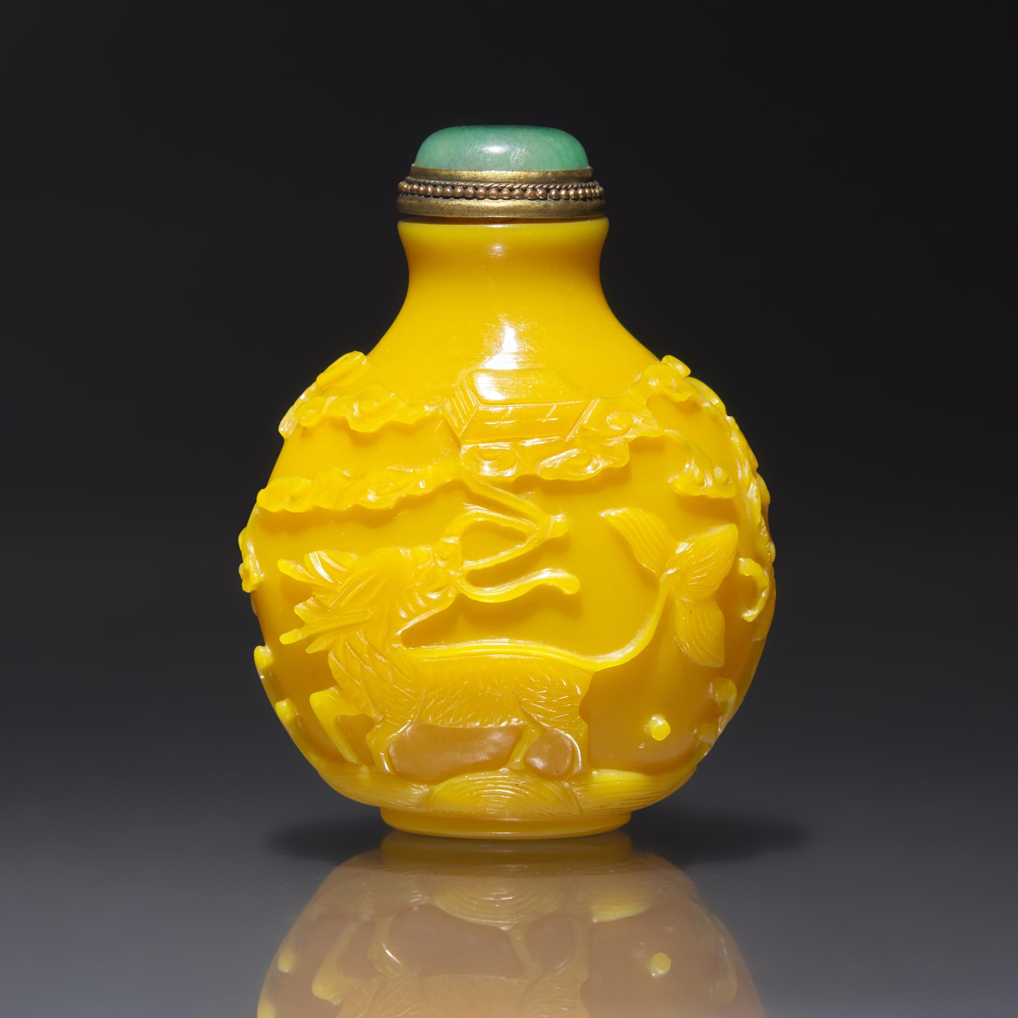 An Imperial Chinese Carved Yellow Glass Snuff Bottle, Qing Dynasty, Circa 1750-1820 — 1750-1820年 御製鷄油黃料吉祥圖鼻煙壺