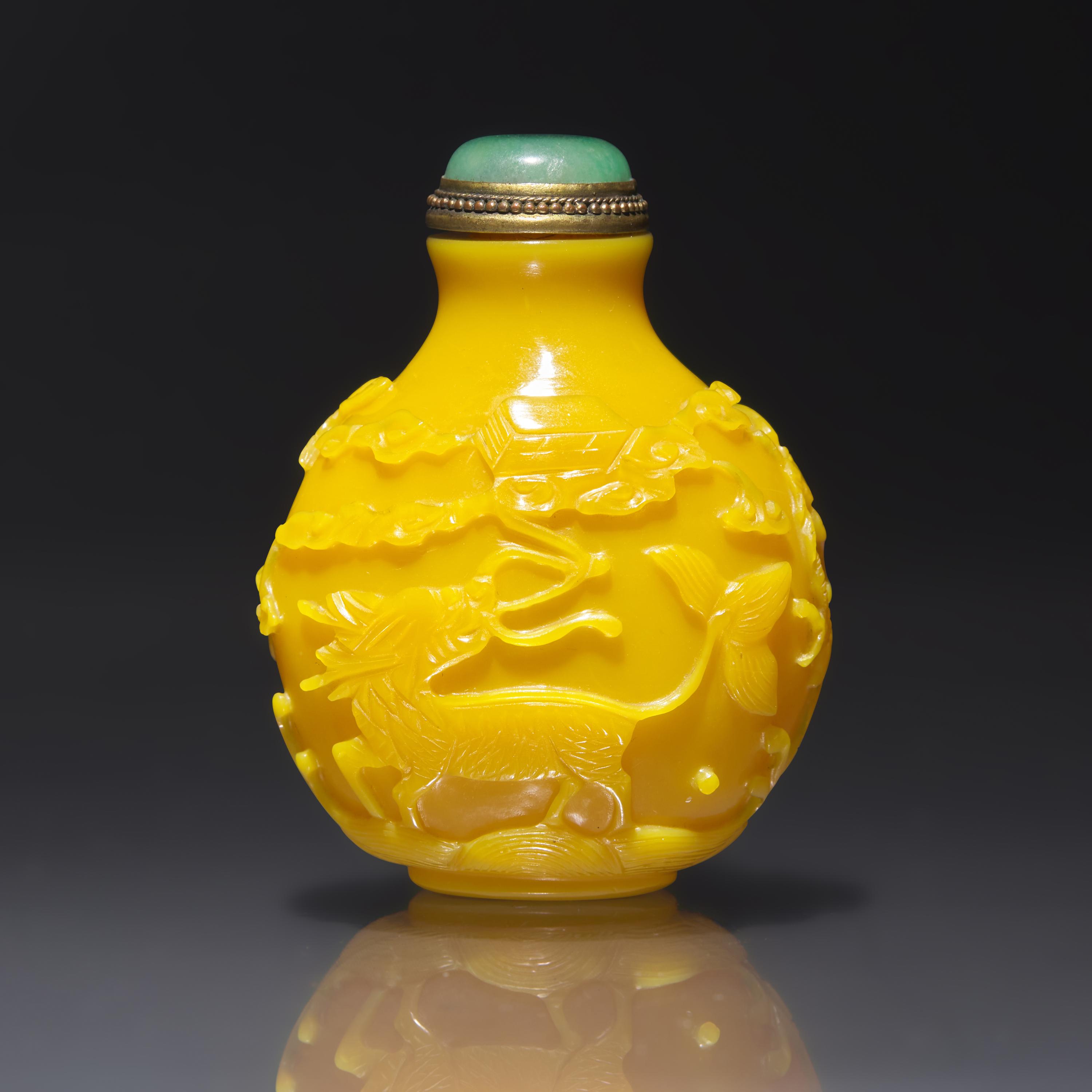 An Imperial Chinese Carved Yellow Glass Snuff Bottle, Qing Dynasty, Circa 1750-1820 — 1750-1820年 御製鷄油黃料吉祥圖鼻煙壺