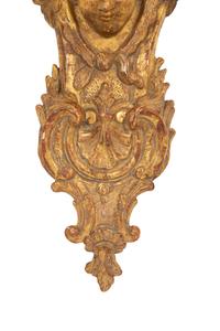 A Pair of Tin-Glazed Earthenware Wall Brackets, and Two Giltwood Wall Brackets