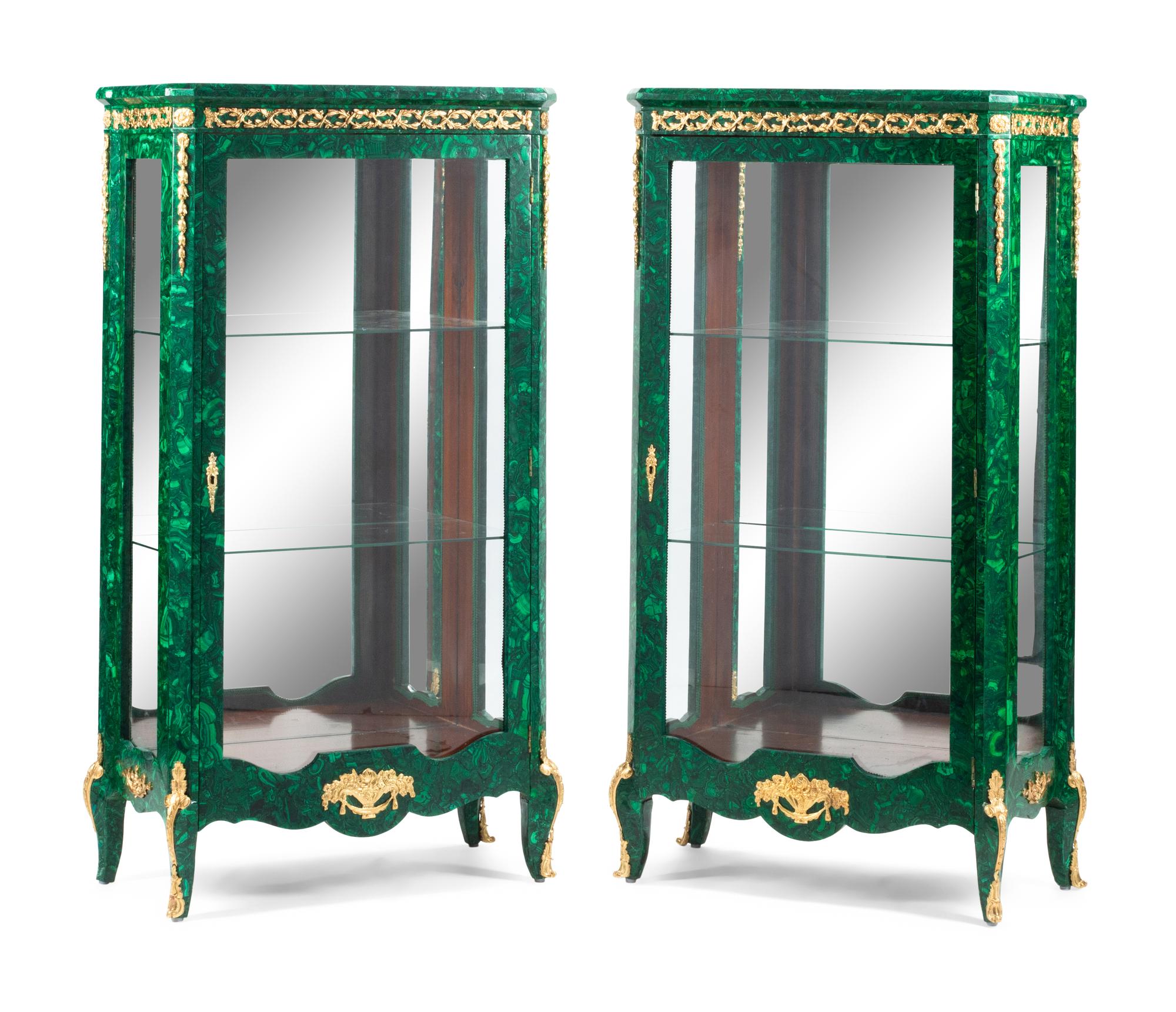 A Pair of Louis XVI Style Gilt Bronze Mounted Malachite Vitrine Cabinets