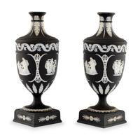 A Pair of Wedgwood Black Jasperware Urns