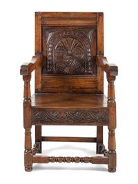 A William and Mary Carved Oak Open Armchair