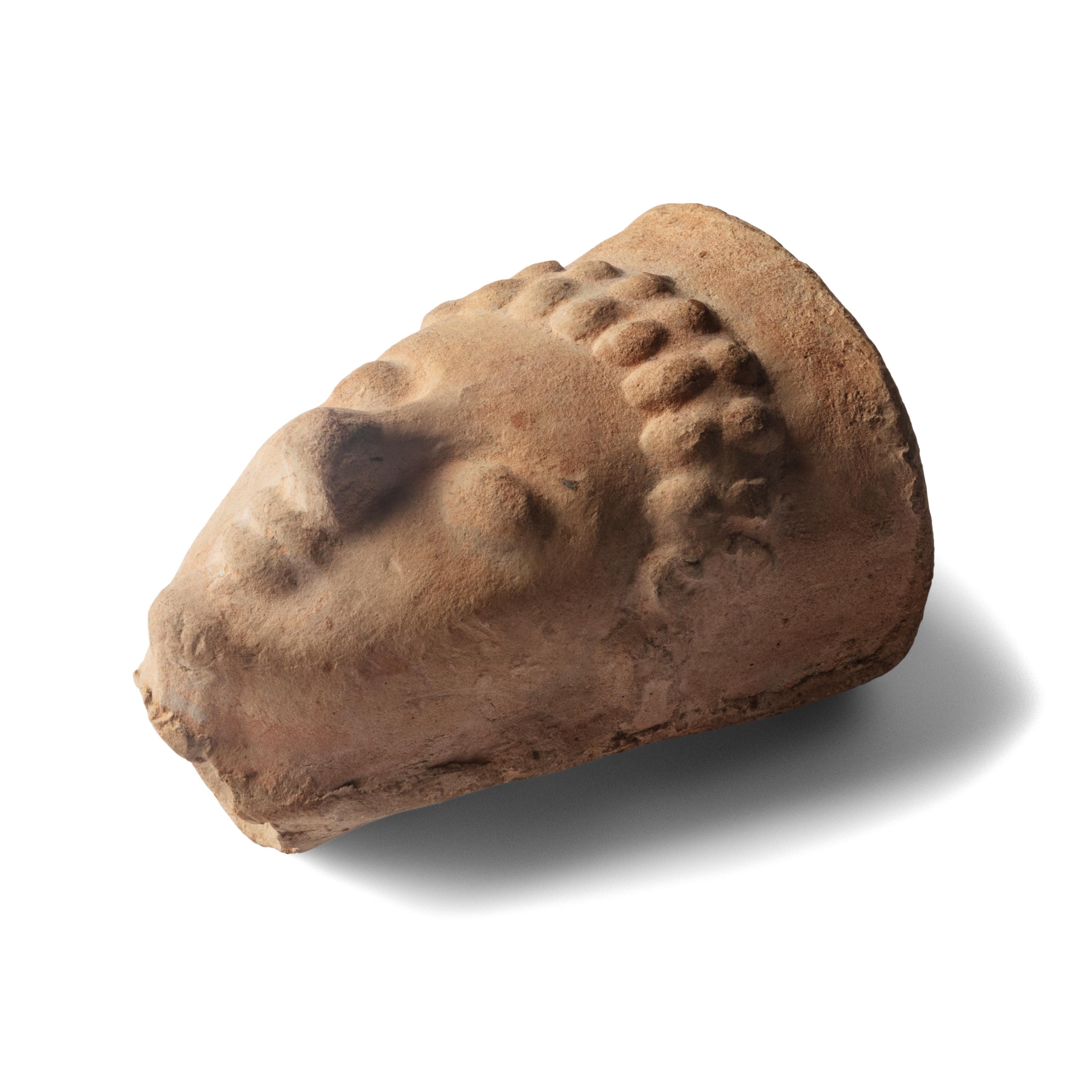A Greek Terracotta Face Fragment