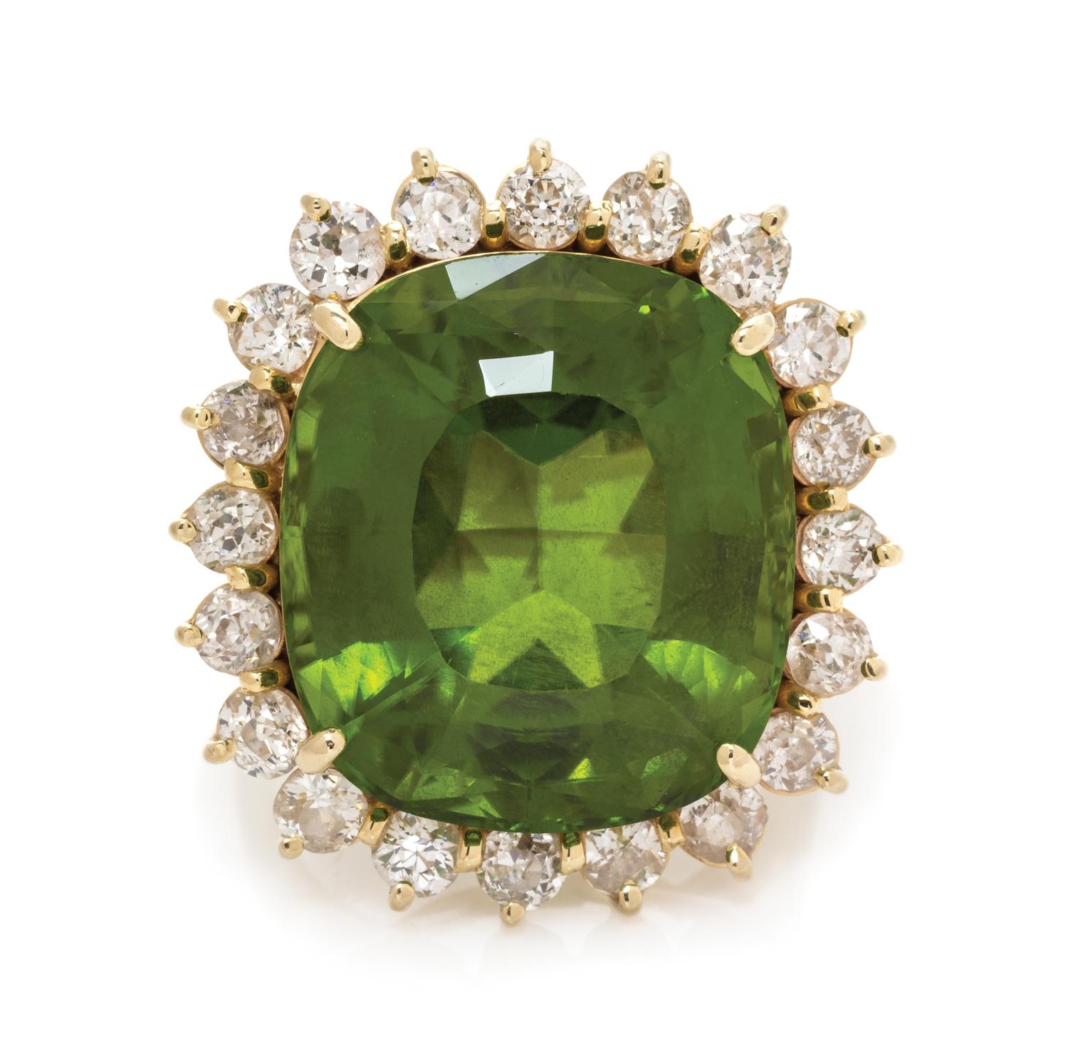 A 14 Karat Yellow Gold, Peridot and Diamond Ring, 11.95 dwts.